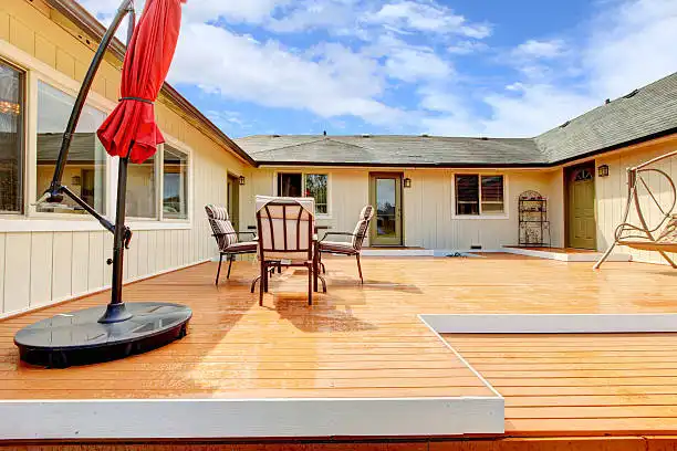 deck repair in centreville va featuring a professionally restored wooden deck and outdoor living space.