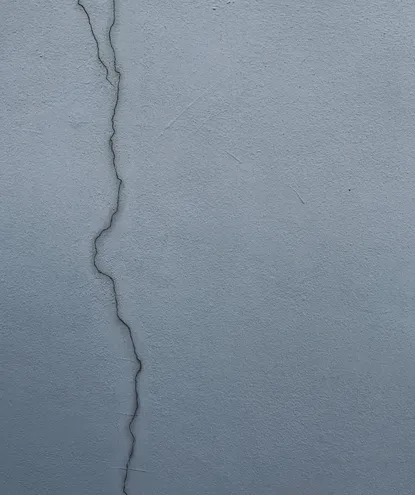 foundation repair in vienna va addressing a vertical settlement crack in a concrete basement wall.