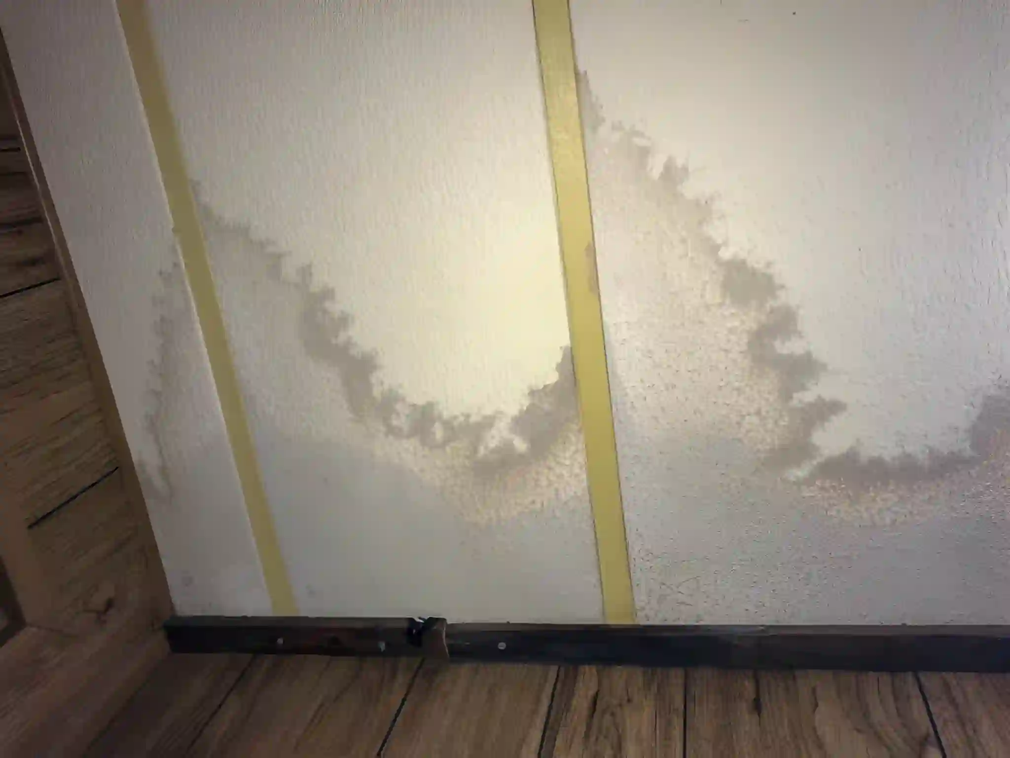 ceiling water stains and moisture damage caused by a roof leak requiring professional roof leak repair services in alexandria va.