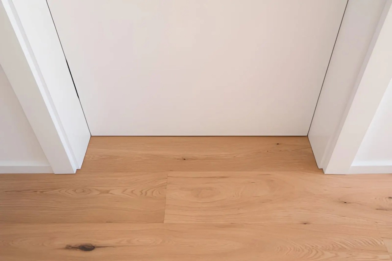 sliding pocket door solutions in reston va showing interior pocket door alignment and hardwood floor track area