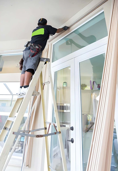 patio door repair in springfield va with technician adjusting sliding glass door track and hardware