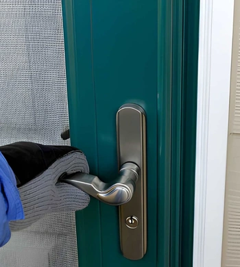 storm door installation in springfield va with modern handle and lock installed on residential exterior door