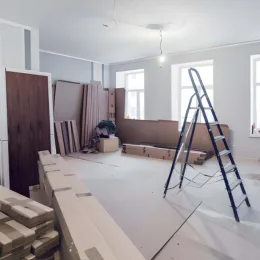 home remodeling project with ladder, drywall, and construction materials during interior renovation work, home remodeling contractor northern virginia