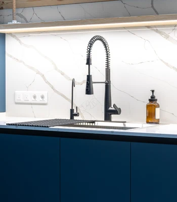 kitchen faucet repair in alexandria va featuring a black pull-down sprayer