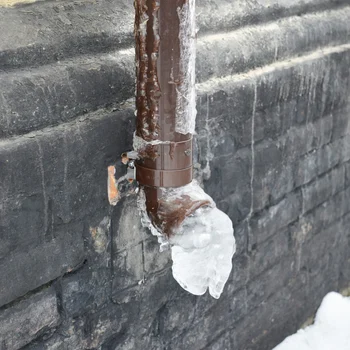 frozen outdoor pipe with ice buildup causing blockage and risk of pipe burst. leaking pipe in annandale va