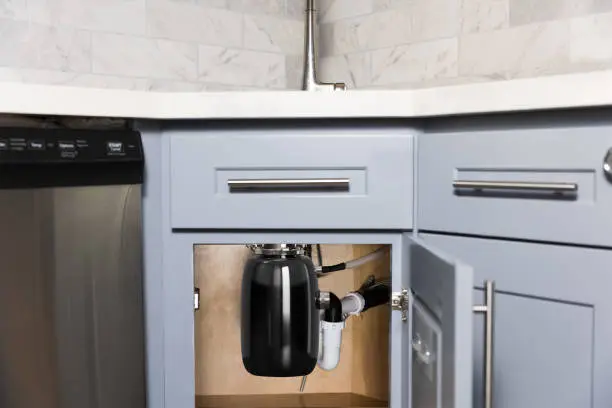 garbage disposal installation in alexandria va, garbage disposal installation under kitchen sink with new disposal unit connected to plumbing