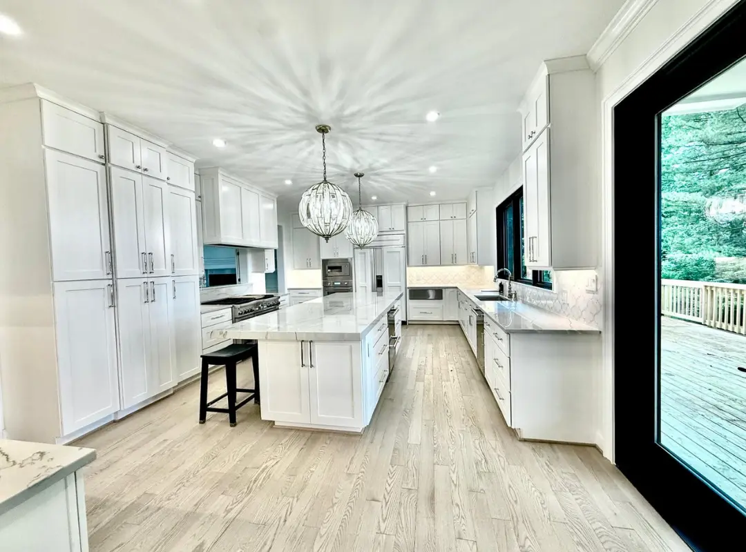 kitchen remodeling in lorton va 5 kitchen remodeling in lorton va – modern custom kitchen remodel with white cabinets, quartz countertops, and a spacious center island.