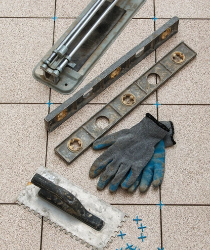 tile repair in fairfax station va with professional tools fixing damaged floor tiles