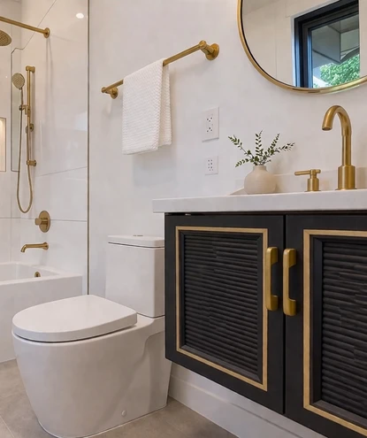 bathroom remodeling in burke va 4 bespoke master bathroom designed by a licensed bathroom remodeler in burke, va, highlighting a dark custom louvered floating vanity with integrated gold accents and matching brushed gold plumbing fixtures.