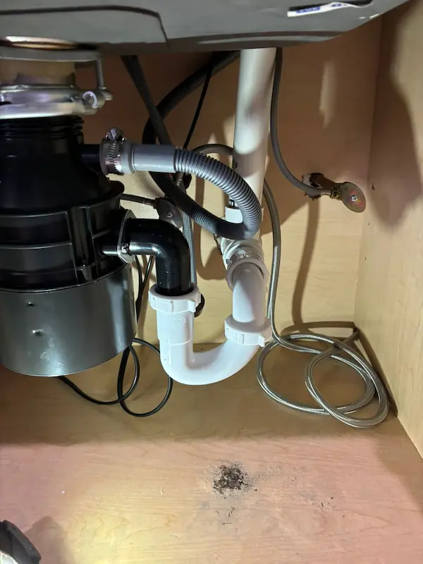 Kitchen drain piping and garbage disposal installation completed in Alexandria VA