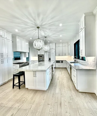 kitchen remodeling in burke va 3 kitchen remodel in burke va – bright custom kitchen with white cabinetry, quartz countertops, and a spacious center island.